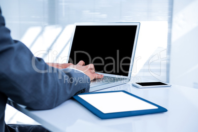 Businessman using his computer