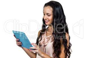 Smiling woman using tablet