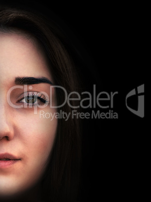 Portrait of young sensual brunette girl on black background