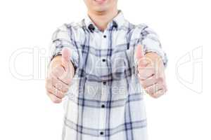 Midsection of man showing thumbs up