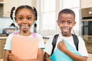 Cute siblings ready for school
