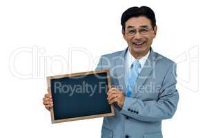 Asian businessman holding a black board