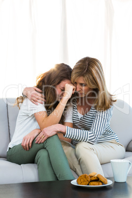 Mother comfort her daughter