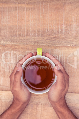 Directly above shot of businessman holding coffee