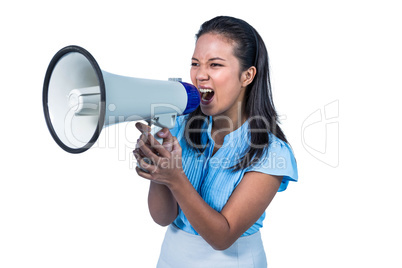 Businesswoman shouting into a megaphone