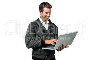 Cheerful man using laptop