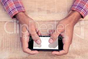 Person texting on smart phone