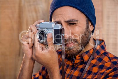 Businessman photographing through camera