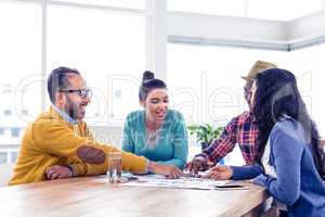 Business team discussing at creative office