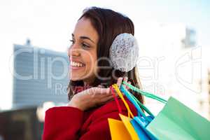 Brunette holding some shopping bags