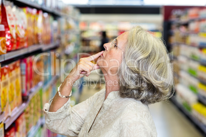 Senior woman choosing food