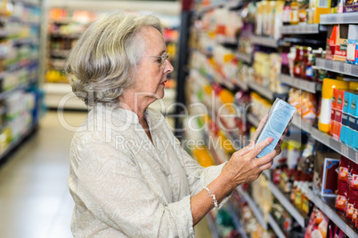 Senior woman buying food