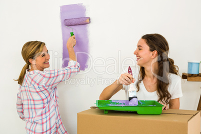 Mother and daughter painting