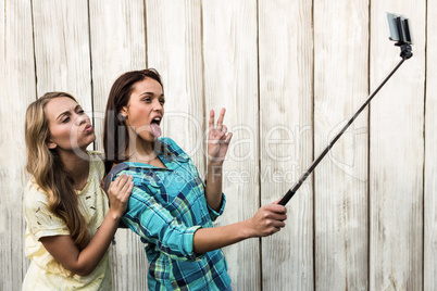 Two pretty friends taking a selfie