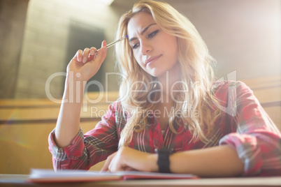 Concentrated female student during class