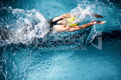 Swimmer woman swimming in the swimming pool