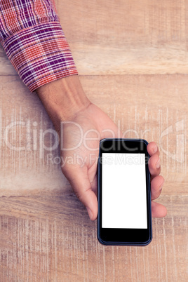 Person holding smart phone