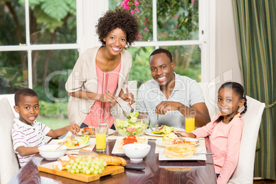 Happy family enjoying their meal