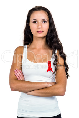 Portrait of serious woman with arms crossed