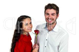 Smiling couple with rose
