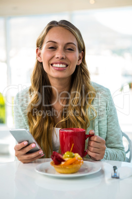 Young girl uses her phone