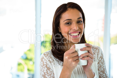 Young girl drink her tea