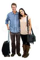 Full length of cheerful couple with luggage