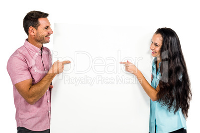 Couple holding white sheet