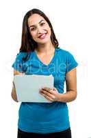 Portrait of beautiful woman writing in notepad
