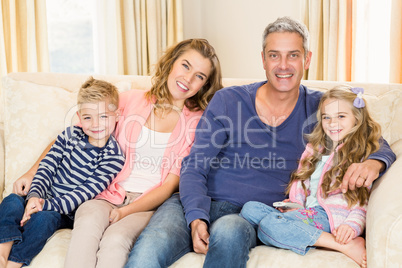 Happy family enjoying a movie together