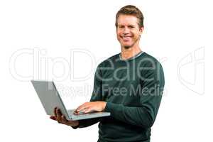 Portrait of smiling man using laptop