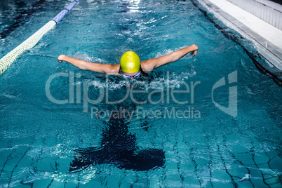Swimmer woman swimming in the swimming pool