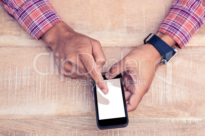 High angle view of man using smart phone