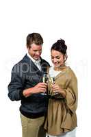 Happy couple holding wine glasses