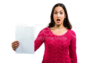 Portrait of worried woman holding document
