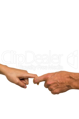 Cropped hands of people holding fingers