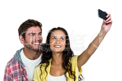 Happy couple taking selfie