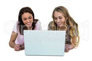 Two girls looking at a laptop