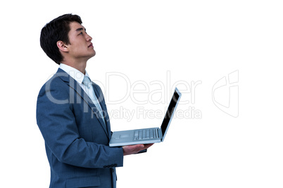Businessman look away with his computer
