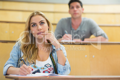 Thoughtful female student during class