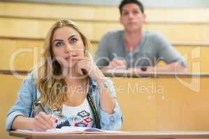 Thoughtful female student during class