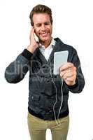 Happy man listening music on mobile phone