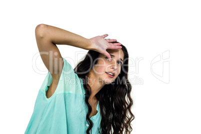 Worried woman covering her face with hand