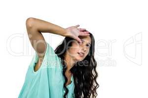 Worried woman covering her face with hand