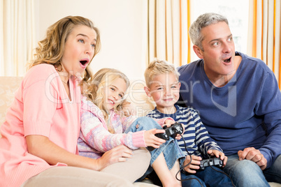 Happy family enjoying a movie together