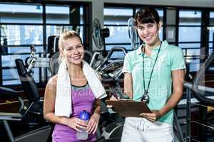 Female Trainer and client smiling