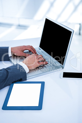 Businessman using his computer Businessman using his computer