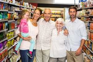 Happy extended family at the supermarket