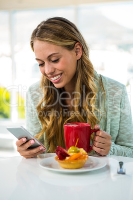 Young girl uses her phone