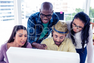 High angle view of happy business people discussing at desk